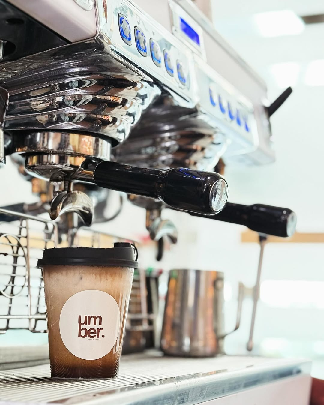 Coffee being poured into a cup